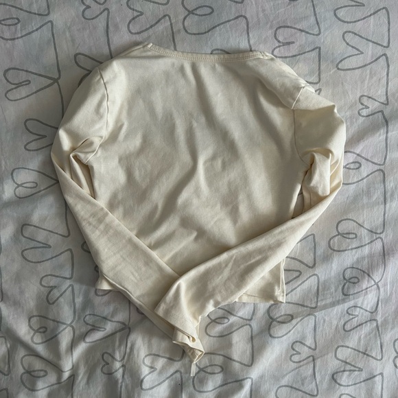small cream/light yellow dainty long sleeve crop top from yesstyle - Picture 3 of 3